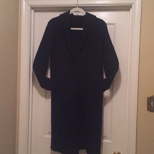 Black hooded sweater coat.